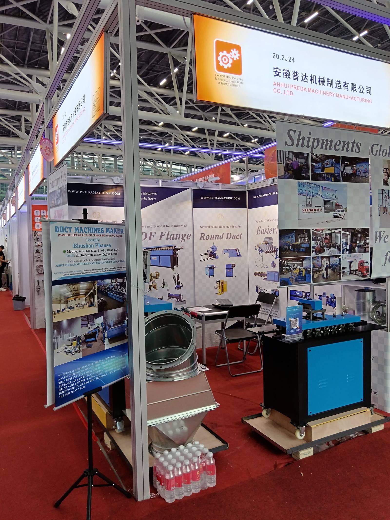 Canton Fair booth overview with spiral duct samples and equipment