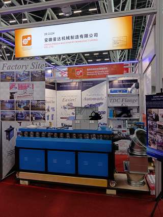 Preda Machine exhibition booth - TDF flange machine on display