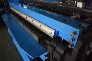 Shearing and folding mechanism detail