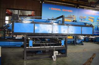 Heavy-duty spiral tubeformer on production floor