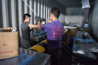 Securing machine inside shipping container